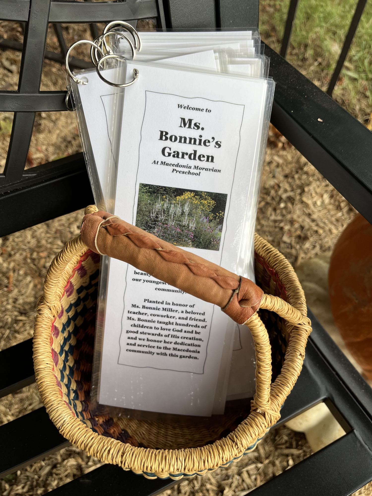 Basket showing pollinator plant information. Grant. Environmental Stewardship Field of Interest.