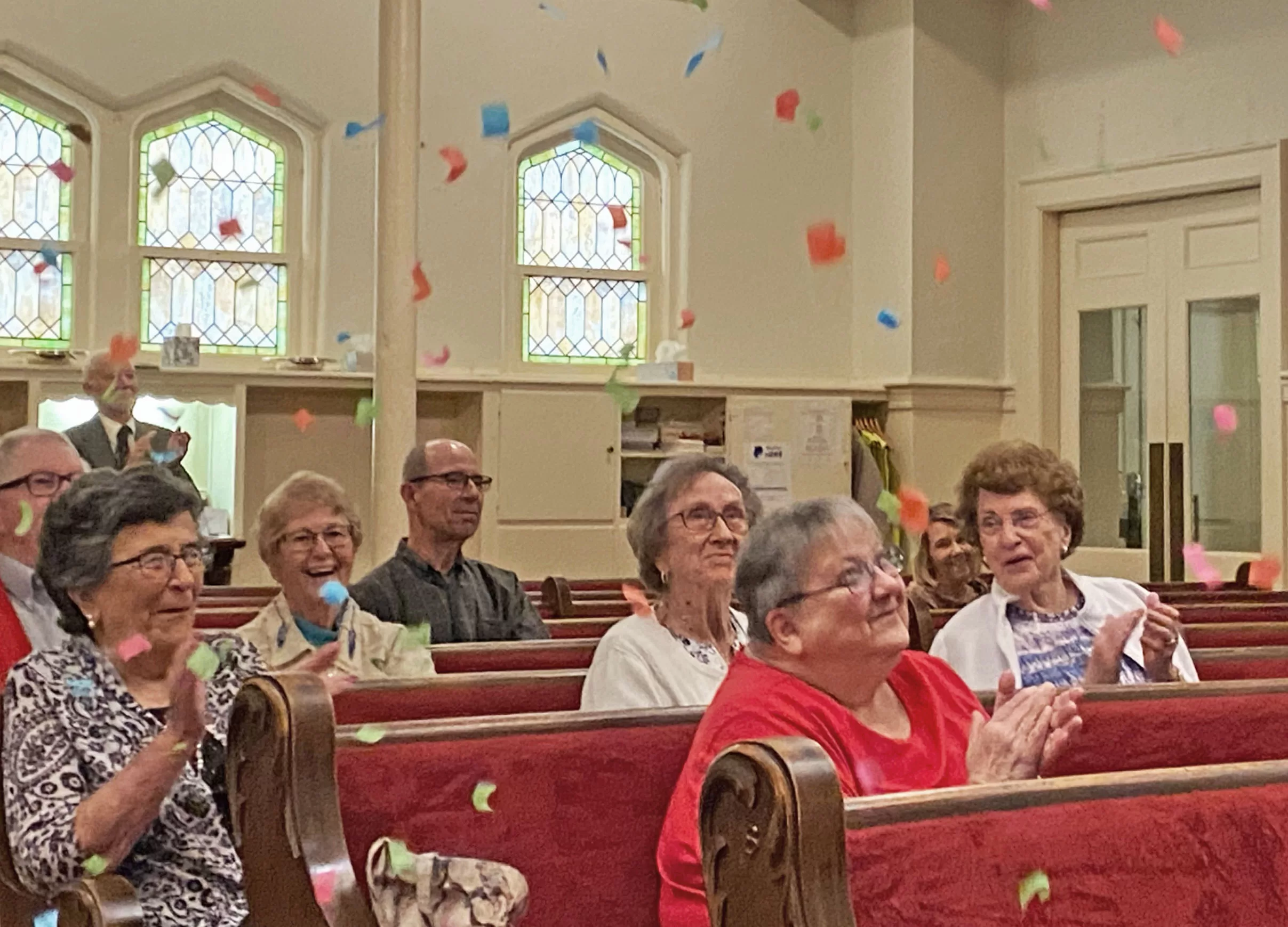 Trinity Moravian Church members celebrate the forgiveness of debt