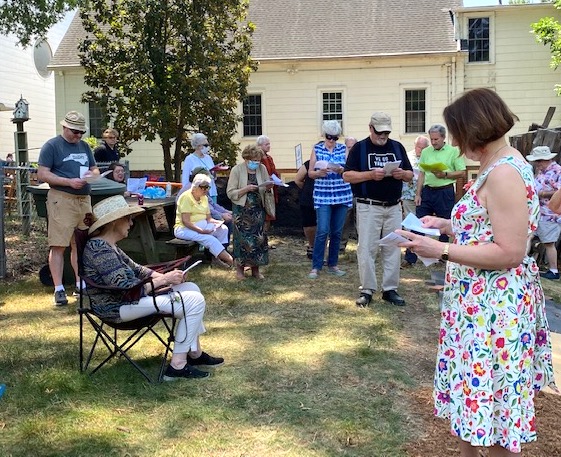 Congregation singing during garden dedication. Grant. MMFA