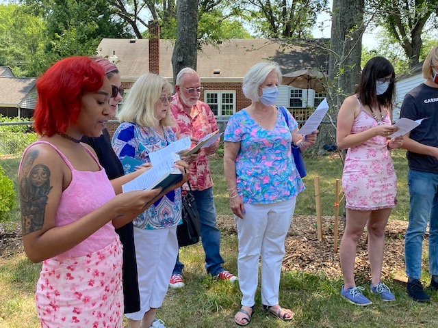 Congregation singing during garden dedication. Grant. MMFA