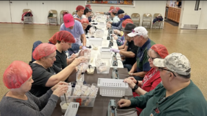 Church Collaboration: Addressing Hunger and Thirst through Meal Packaging