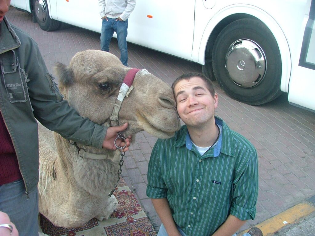 Justin Rabbach, BWM Executive Director, with camel